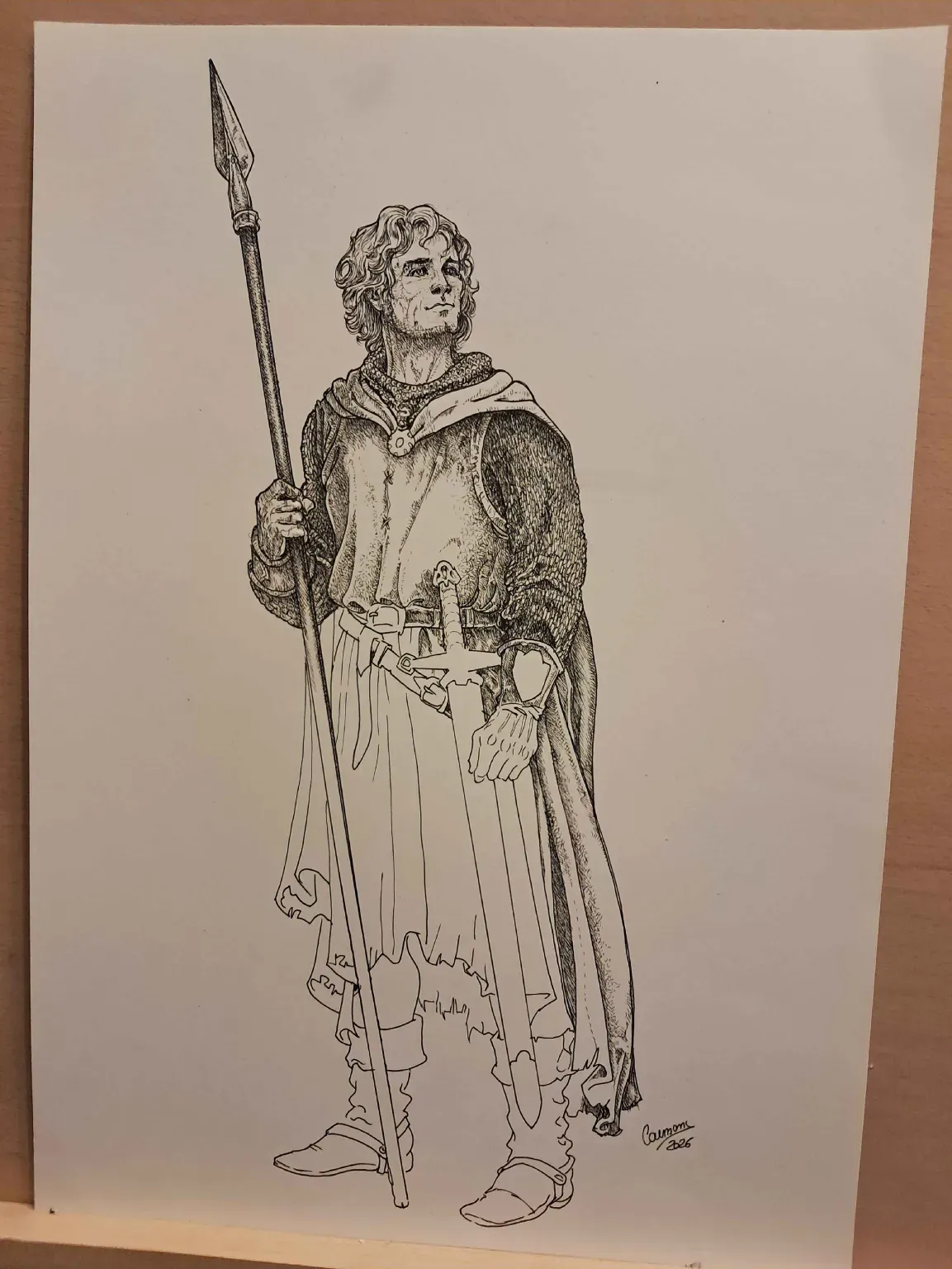 L'original à l'encre de Perceval par Robert Carmona, posé sur une table